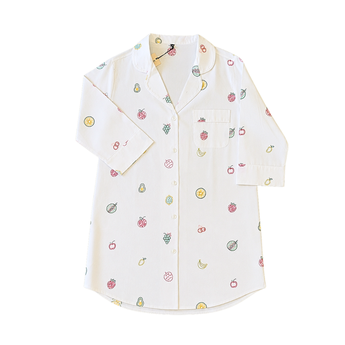 An X-Large white long-sleeve pajama button-down shirt featuring colorful, detailed hand embroidery of fruits.