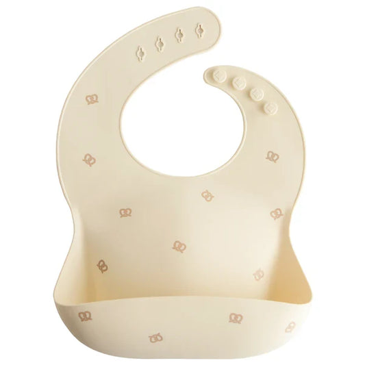 Mushie - Silicone Baby Bib in Pretzel