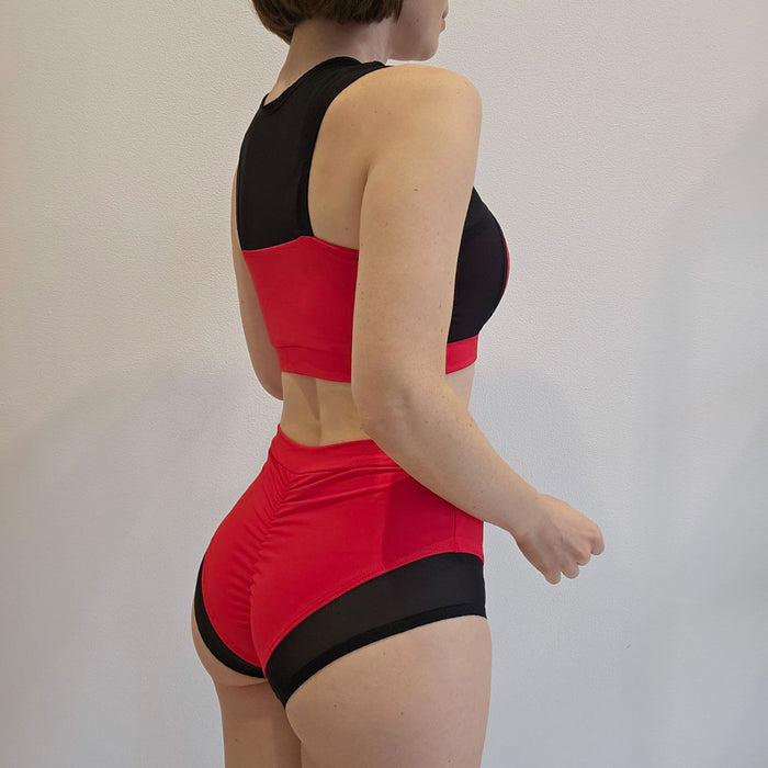 Pole dance costume with black translucent inserts on the top and bottom