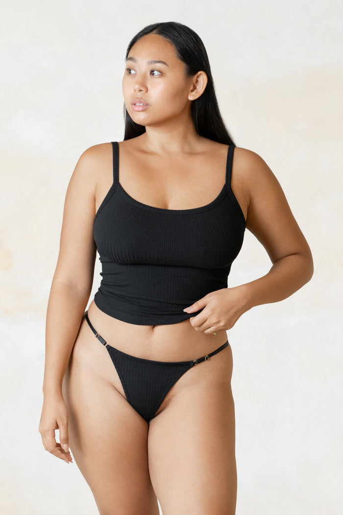 Studio K Rib One Shoulder Top in Black – sustainable, stylish, and comfortable yoga and lounge wear, available in multiple sizes.